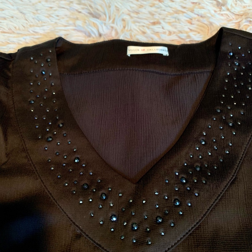Vocal Brand woman’s stain top size XL NWT
